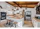 Spacious kitchen featuring an island, stainless steel appliances, and white cabinetry at 37209 N 12Th St, Phoenix, AZ 85086