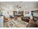 Spacious living room with a view into the kitchen and dining area at 37209 N 12Th St, Phoenix, AZ 85086