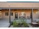 Covered patio with seating area and lush landscaping at 37209 N 12Th St, Phoenix, AZ 85086