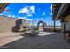 Courtyard with stone arch, fireplace and planting area at 37209 N 12Th St, Phoenix, AZ 85086