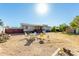 Large backyard with patio furniture and a grill at 3810 W Mohawk Ln, Glendale, AZ 85308