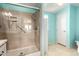 Bathroom with walk-in shower and grab bars at 3810 W Mohawk Ln, Glendale, AZ 85308