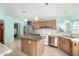 Kitchen with an island and stainless steel appliances at 3810 W Mohawk Ln, Glendale, AZ 85308