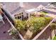 Aerial view showcasing a home's backyard with patio and landscaping at 3818 N Lomond Cir, Mesa, AZ 85215