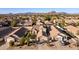 Aerial view of a residential neighborhood with mountain backdrop at 3818 N Lomond Cir, Mesa, AZ 85215