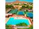 Resort-style pool and tennis courts with mountain views at 3818 N Lomond Cir, Mesa, AZ 85215