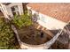 Courtyard with a tree and stone wall at 3818 N Lomond Cir, Mesa, AZ 85215