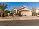 Exterior view of a single-story house with a garage at 3818 N Lomond Cir, Mesa, AZ 85215