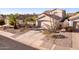 Curb appeal! Two-story home with attached garage and desert landscaping at 3818 N Lomond Cir, Mesa, AZ 85215