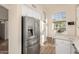 Spacious kitchen with stainless steel appliances and white cabinets at 3818 N Lomond Cir, Mesa, AZ 85215