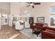 Bright and airy living room with hardwood floors and high ceilings at 3818 N Lomond Cir, Mesa, AZ 85215