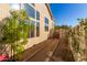 Landscaped side yard with pathway, gate, and mature plants at 3818 N Lomond Cir, Mesa, AZ 85215