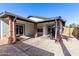 Spacious backyard with a patio and gravel landscaping at 4009 W Cielo Grande Rd, Glendale, AZ 85310