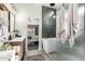 Spa-like bathroom featuring a soaking tub and walk-in shower at 4009 W Cielo Grande Rd, Glendale, AZ 85310