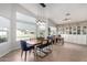 Bright dining room with built-in shelving and a workspace at 4009 W Cielo Grande Rd, Glendale, AZ 85310