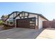 Updated home exterior with new paint and garage door at 4009 W Cielo Grande Rd, Glendale, AZ 85310