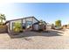 Modern home exterior with updated garage and landscaping at 4009 W Cielo Grande Rd, Glendale, AZ 85310