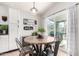 Charming kitchen nook with a round table and chairs, perfect for casual dining at 4009 W Cielo Grande Rd, Glendale, AZ 85310