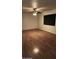 Spacious living room with light flooring and a large window at 404 W 13Th St, Eloy, AZ 85131