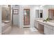 Elegant bathroom with double sinks, soaking tub, and walk-in shower at 4430 N 22Nd St # 1, Phoenix, AZ 85016