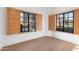 Bright bedroom with light wood floors and plantation shutters at 4430 N 22Nd St # 1, Phoenix, AZ 85016