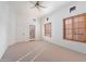 Bright bedroom with neutral carpeting and plantation shutters at 4430 N 22Nd St # 1, Phoenix, AZ 85016