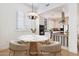 Breakfast nook area features a stylish marble table with views of the adjacent modern kitchen at 4430 N 22Nd St # 1, Phoenix, AZ 85016