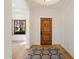 Bright and airy entry with hardwood floors and wood door at 4430 N 22Nd St # 1, Phoenix, AZ 85016