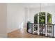 Open landing with a curved railing overlooking the first floor at 4430 N 22Nd St # 1, Phoenix, AZ 85016