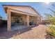 Backyard view showcasing a covered patio at 4466 N 200Th Ln, Litchfield Park, AZ 85340