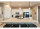 Modern kitchen with white cabinets, stainless steel appliances, and a large island at 4466 N 200Th Ln, Litchfield Park, AZ 85340