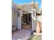 Inviting entrance with a wrought iron gate and pergola at 5100 N Miller Rd # 20, Scottsdale, AZ 85250