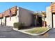 Front view of a charming home with a pergola and American flag at 5100 N Miller Rd # 20, Scottsdale, AZ 85250