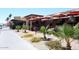 Bustling street scene with various restaurants and shops at 5100 N Miller Rd # 20, Scottsdale, AZ 85250