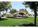 A gazebo in a grassy park setting with trees at 5100 N Miller Rd # 20, Scottsdale, AZ 85250