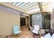 Peaceful covered patio with tiled flooring and seating at 5100 N Miller Rd # 20, Scottsdale, AZ 85250