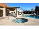 Relaxing spa and refreshing pool area with patio furniture at 5100 N Miller Rd # 20, Scottsdale, AZ 85250