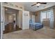 Guest bedroom with a bed and built-in shelving at 5227 W Desperado Way, Phoenix, AZ 85083