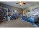 Cozy bedroom featuring a bed, desk, and wall decor at 5227 W Desperado Way, Phoenix, AZ 85083