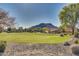 Landscaped green space with mountain views at 5227 W Desperado Way, Phoenix, AZ 85083