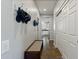 Bright hallway with tile flooring and bench seating at 5227 W Desperado Way, Phoenix, AZ 85083