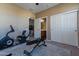 Home gym with exercise bike and weight bench at 5227 W Desperado Way, Phoenix, AZ 85083