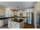 Spacious kitchen featuring an island and stainless steel appliances at 5227 W Desperado Way, Phoenix, AZ 85083