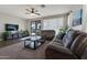 Comfortable living room with large windows and a view of the pool at 5227 W Desperado Way, Phoenix, AZ 85083