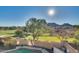 Stunning view of a backyard pool with mountain backdrop at 5227 W Desperado Way, Phoenix, AZ 85083