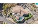 An aerial view showing the house layout, beautiful yard with pool, and surrounding landscape at 5655 N Camelback Canyon Dr, Phoenix, AZ 85018