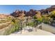 Balcony includes a bistro table and two chairs with spectacular views of the surrounding mountains at 5655 N Camelback Canyon Dr, Phoenix, AZ 85018