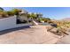 Circular driveway showcasing the home's hillside setting and manicured landscaping at 5655 N Camelback Canyon Dr, Phoenix, AZ 85018