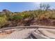 Landscaped backyard featuring hardscape and mature landscaping at 5655 N Camelback Canyon Dr, Phoenix, AZ 85018