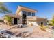 Contemporary home featuring a landscaped yard and modern architectural design at 5655 N Camelback Canyon Dr, Phoenix, AZ 85018